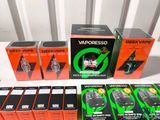 a lot of vapes that are sitting on a table