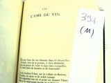 an open book with a piece of paper on top of it