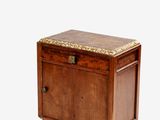 an old wooden chest with a marble top on wheels