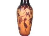a vase that has a picture of a bird on it