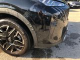 a close up of a car ' s tire on the street