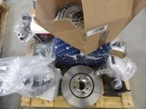 a box of assorted items on a pallet in a warehouse