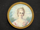 portrait of a woman in a pink dress with a tiable
