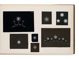 an open book with black and white pictures of stars on it