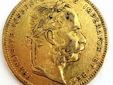 l'image d'une pièce d'or sur laquelle figure le visage d'un homme