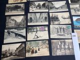 a lot of old photos on the table together