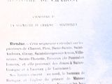 un gros plan d'un livre ouvert sur lequel figure l'image d'un chat