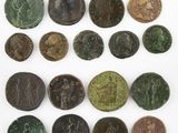 a collection of roman coins, including a roman coin and a roman coin