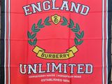 a red and black flag with the words england on it