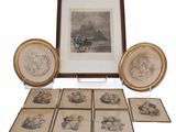 a picture of a group of framed pictures on a table
