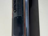 a picture of an open box with a phone inside of it