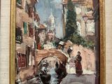 une peinture à l'huile représentant un bateau sur un canal dans une ville
