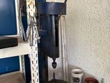 a machine that is sitting on a shelf in a room