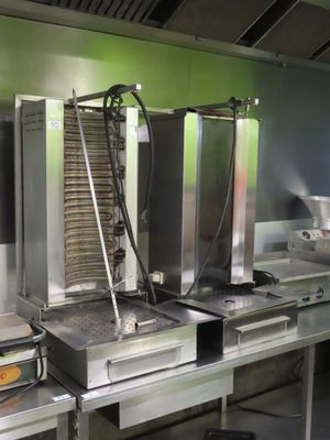 many machines that are cooking food in the kitchen