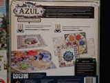 a box with a game on it and a card game on it