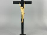 black and gold crucifix with jesus on the cross