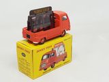 a red toy truck that is sitting on top of a box