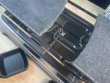 a laptop computer sitting on top of a wooden desk