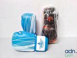a pair of boxing gloves sitting next to a bag of candy