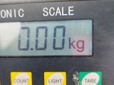 a close up of a digital scale on a table