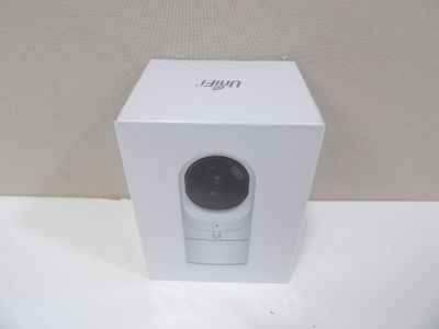 an image of a white box with a small camera inside of it