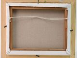 a close up of a picture frame with a string hanging from it