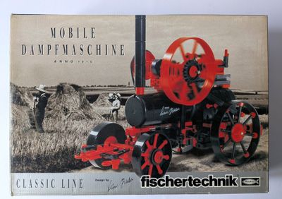 une photo d'un modèle de tracteur agricole dans une boîte