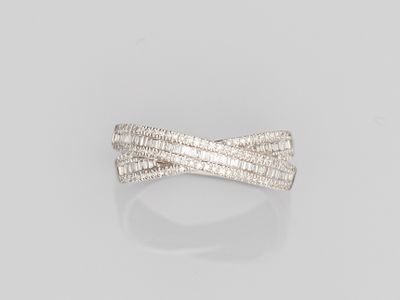 a white gold ring with three rows of diamonds