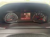 a close up of a car dashboard with a speedometer and gauges