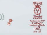 an image of a plate with a red and white design on it