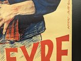a poster of a man in a military uniform holding a gun