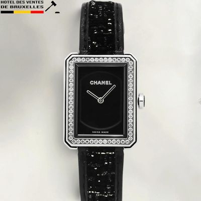 chanel watch with black leather strap and diamond bezeling