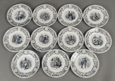 twelve black and white plates with pictures of people on them
