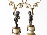 pair of antique brass and marble candelabs with cherenshes