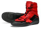 pair of red and black shoes with black soles on a white background