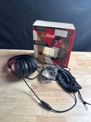 a close up of a pair of headphones sitting on a table