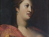 portrait d'une femme portant un châle rouge près d'une fenêtre