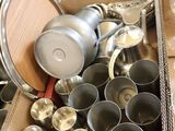 a box full of pots and pans sitting on a table