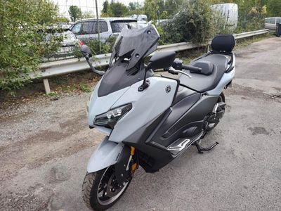 a motorcycle that is parked on the side of the road