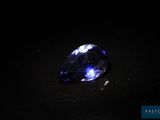 a blue sapphire in the dark