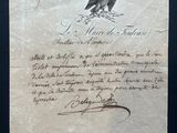 an old letter with a picture of two birds on it