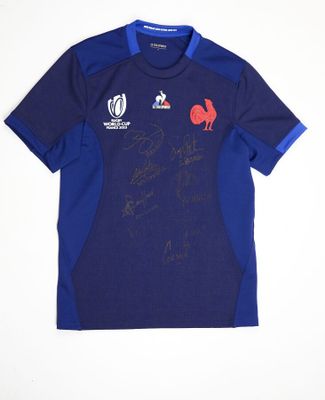 a blue shirt with a picture of a rooster on it
