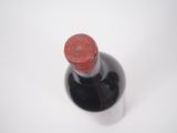 a bottle of wine that is sitting on a table