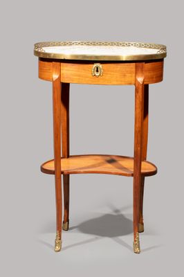 a small table with a marble top on a wooden stand