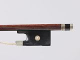 a violin bow with a piece of string attached to it