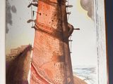 un livre ouvert sur lequel figure l'image d'un phare