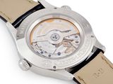 an image of a close up of a watch on a white surface