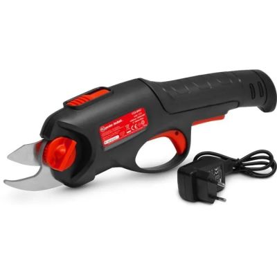 un gros plan d'un couteau électrique noir et rouge sur fond blanc