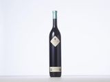 a bottle of wine that is sitting on a table