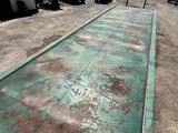 a long metal ramp on the side of the road